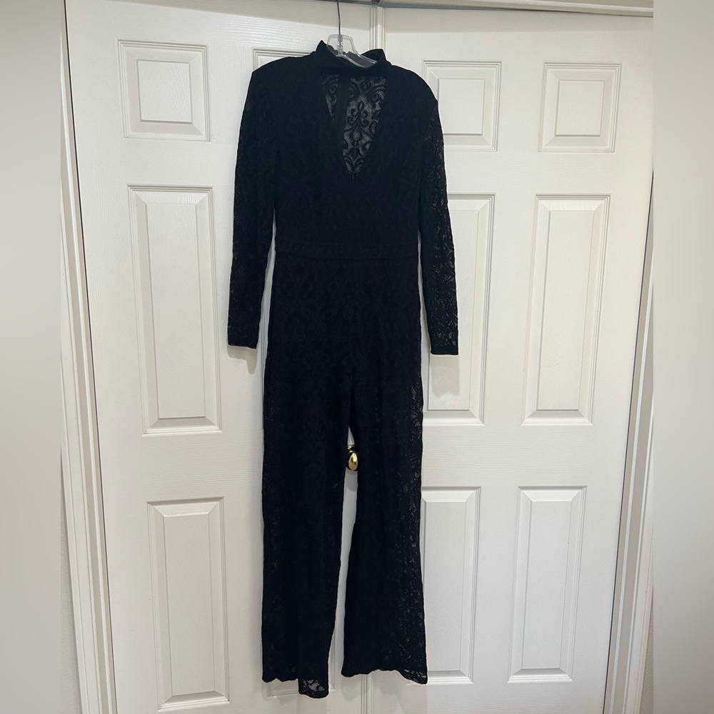 Bebe black lace jumpsuit high neck‎ with a v cut